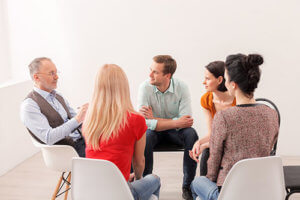 Addiction group therapy treatment services in action
